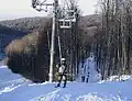 Ski lifts and slopes covered with natural snow in 2006