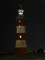 The tower lit by candles in 2009 to mark its 250th anniversary