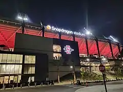 Snapdragon Stadium façade at night