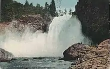 A 1910 hand color photo of Snoqualmie Falls.