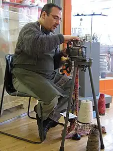 A sock-knitting machine in use