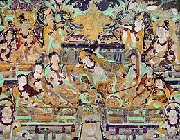 Buddhist cave art, a dancer spins while the orchestra plays.