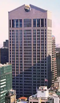 550 Madison Avenue, New York, with a top broken pediment, reminiscent of those found in Baroque and at highboys, by Philip Johnson, 1981-1984