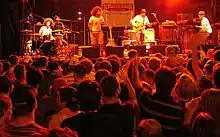 Soulive and Reggie Watts performing at the Rochester International Jazz Festival in 2006