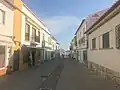 Colorful buildings line the quiet streets