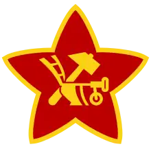 Star, hammer and plough cockade of the Red Army (1918, soon replaced with a hammer and sickle cockade).