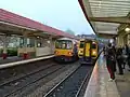 A Class 144 'pacer' (left) and a Class 158 'sprinter' (right) at the station in 2011.