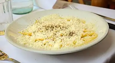 Spaghetti cacio e pepe at a restaurant in Rome