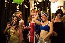 Fans dressed up as the Spice Girls, including a replica of the Union Jack dress