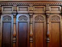 Dado in carved oak, designed by W. S. Barber at Spring Hall, Halifax