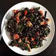 A dish made of squid ink pasta