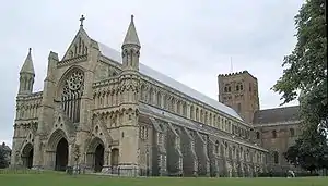 St Albans Abbey following restoration. A mix of architectural styles and a pitched roof.