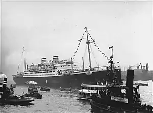 SS St. Louis surrounded by smaller vessels in its home port of Hamburg