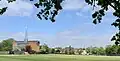 Alleyn's main building (right) and Saint Barnabas' Church (left)