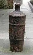 Old cannon used as bollard, outside the church of St Helen's Bishopsgate, London