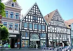 Market square. The photo shows the entrance to the Marktpassage, an indoor shopping arcade.