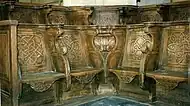 Choir stalls in the church of St. Pierre, Coutances, France, with the seats down