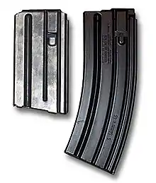 Vietnam era 20-round M16 magazine (left) and current issue NATO STANAG 30-round magazine (right).