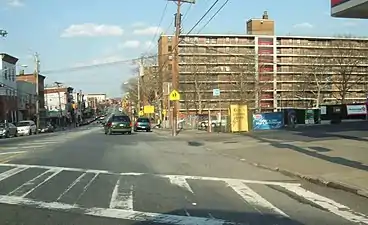 Stapleton Houses (right), looking northeast down Broad Street