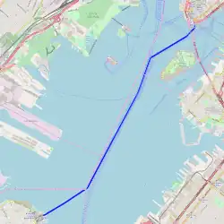 The Staten Island Ferry takes a curved route between Manhattan and Staten Island, two islands in New York City.