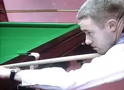 Stephen Hendry playing a shot