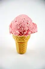 A strawberry ice cream cone