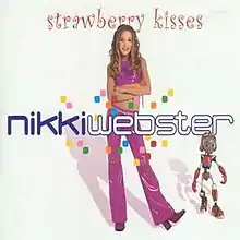 The artist stands with her left leg stretched to her left and her arms folded at her bared waist. Her top and pants are matching in largely purple-pink with swirls. She wears her blonde-brown hair over shoulder length, it is highly curled. To her left is a child's toy/doll, which appears to be dancing. The single's title is across the top in pink-red script. The artist's name is across her middle.