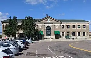 A large railroad station building in an urban area