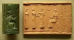 Sumerian cylinder seal and impression, dated c. 2100 BC, of Ḫašḫamer, ensi (governor) of Iškun-Sin c. 2100 BC. The seated figure is probably king Ur-Nammu, bestowing the governorship on Ḫašḫamer, who is led before him by Lamma (protective goddess)..mw-parser-output cite.citation{font-style:inherit;word-wrap:break-word}.mw-parser-output .citation q{quotes:"\"""\"""'""'"}.mw-parser-output .citation:target{background-color:rgba(0,127,255,0.133)}.mw-parser-output .id-lock-free.id-lock-free a{background:url("//upload.wikimedia.org/wikipedia/commons/6/65/Lock-green.svg")right 0.1em center/9px no-repeat}body:not(.skin-timeless):not(.skin-minerva) .mw-parser-output .id-lock-free a{background-size:contain}.mw-parser-output .id-lock-limited.id-lock-limited a,.mw-parser-output .id-lock-registration.id-lock-registration a{background:url("//upload.wikimedia.org/wikipedia/commons/d/d6/Lock-gray-alt-2.svg")right 0.1em center/9px no-repeat}body:not(.skin-timeless):not(.skin-minerva) .mw-parser-output .id-lock-limited a,body:not(.skin-timeless):not(.skin-minerva) .mw-parser-output .id-lock-registration a{background-size:contain}.mw-parser-output .id-lock-subscription.id-lock-subscription a{background:url("//upload.wikimedia.org/wikipedia/commons/a/aa/Lock-red-alt-2.svg")right 0.1em center/9px no-repeat}body:not(.skin-timeless):not(.skin-minerva) .mw-parser-output .id-lock-subscription a{background-size:contain}.mw-parser-output .cs1-ws-icon a{background:url("//upload.wikimedia.org/wikipedia/commons/4/4c/Wikisource-logo.svg")right 0.1em center/12px no-repeat}body:not(.skin-timeless):not(.skin-minerva) .mw-parser-output .cs1-ws-icon a{background-size:contain}.mw-parser-output .cs1-code{color:inherit;background:inherit;border:none;padding:inherit}.mw-parser-output .cs1-hidden-error{display:none;color:#d33}.mw-parser-output .cs1-visible-error{color:#d33}.mw-parser-output .cs1-maint{display:none;color:#2C882D;margin-left:0.3em}.mw-parser-output .cs1-format{font-size:95%}.mw-parser-output .cs1-kern-left{padding-left:0.2em}.mw-parser-output .cs1-kern-right{padding-right:0.2em}.mw-parser-output .citation .mw-selflink{font-weight:inherit}html.skin-theme-clientpref-night .mw-parser-output .cs1-maint{color:#18911F}html.skin-theme-clientpref-night .mw-parser-output .cs1-visible-error,html.skin-theme-clientpref-night .mw-parser-output .cs1-hidden-error{color:#f8a397}@media(prefers-color-scheme:dark){html.skin-theme-clientpref-os .mw-parser-output .cs1-visible-error,html.skin-theme-clientpref-os .mw-parser-output .cs1-hidden-error{color:#f8a397}html.skin-theme-clientpref-os .mw-parser-output .cs1-maint{color:#18911F}}"Cylinder vase". Collections Search – Museum of Fine Arts, Boston. May 20, 1987. Archived from the original on November 11, 2021. Retrieved November 11, 2021.