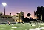 Cal Poly's women's soccer team scrimmages as the sun sets on Mustang Memorial Field during the 2023 preseason.