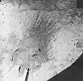 Effects of the vernier-rocket engine blast on the double imprint previously made in the lunar surface by one of the spacecraft's crushable blocks during the initial touchdown.