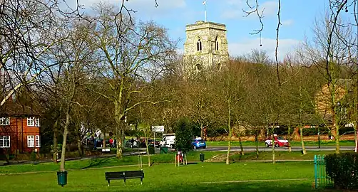 Looking towards the northern end of Sutton High Street from Sutton Green. (All Saints church is in the distance.)