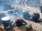 Cooking of Svadbarski Kupus (wedding cabbage) in clay pots, Serbia