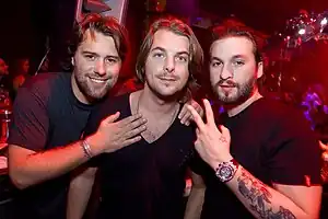 Swedish House Mafia in 2011. From left to right: Sebastian Ingrosso, Axwell, Steve Angello