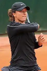 Iga Świątek, the 2023 women's singles champion. It was her fourth major title and her third at the French Open.