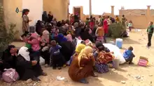 Refugees fleeing the clashes in Tabqa