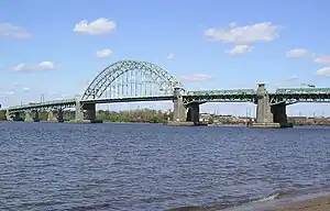 Tacony–Palmyra Bridge as seen from the New Jersey shoreline looking at Tacony