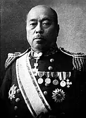 Neck high portrait of middle aged man wearing a military uniform