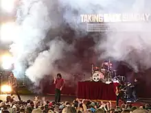 Taking Back Sunday on a smoky stage