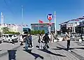 Atatürk Cultural Center at Taksim Square in 2022, with the entrance of the Taksim station of the Istanbul Metro.