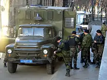 Green Kamysh wearing Tambov OMON units in Nizhny Novgorod with a "truck bus" on a ZIL-130.