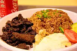 Tapsilog, a common Filipino breakfast made of egg, rice, and beef or venison