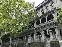 Tasma Terrace, East Melbourne. Victorian Free Classical terrace with filigree verandahs; completed 1879. The headquarters of the National Trust (Victoria).