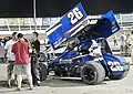 Malsam (right) beside his 2016 Sprint Car at Badlands Motor Speedway