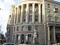 Front of a 1950s apartment building with a cinema downstairs now given to the city's Philharmonic Hall for Children and Youth.