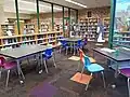 Young Adult books lining the shelves inside the Teen Lounge