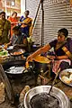 A woman making bajjis in Mylapore