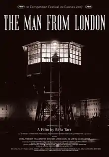 A shadowy figure stands at the window of an illuminated hexagonal viewing tower with a ladder in front for access. The surroundings are darkened with the exception of dimly lit multi-storey buildings in the background. Above the tower in capital letters the title of the film, THE MAN FROM LONDON, appears accompanied by a note reading "In Competition Festival du Cannes 2007" with the festival's logo on either side. At the foot of the poster, below the tower, the film's production credits are superimposed. Below it is listed the production credits.