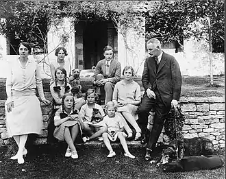 The Mitford family 1928; Front row, L to R, mother (Sydney Bowles),  Unity, Jessica and Deborah, father (David Freeman-Mitford, 2nd Baron Redesdale); middle row, Diana and Pamela; back row, Nancy and Tom.