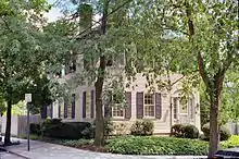 The Samuel B. Mumford House, slightly obscured by trees